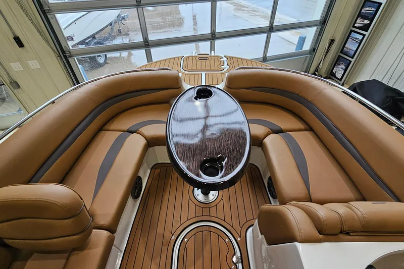 Slide: The Image of Luxurious interior of 2022 Starcraft Star Step 221 E I/O boat with elegant seating and table. - 18