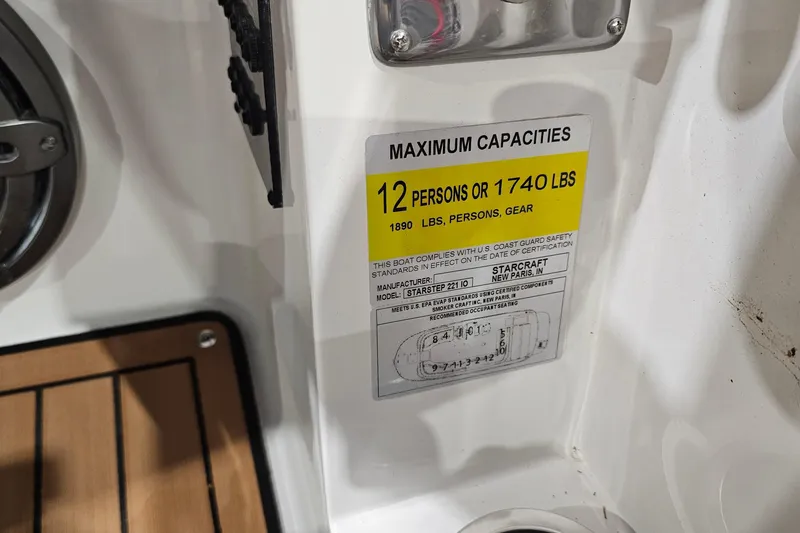 Slide: The Image of 2022 Starcraft Star Step 221 E I/O boat capacity label, 12 persons or 1740 lbs. - 19
