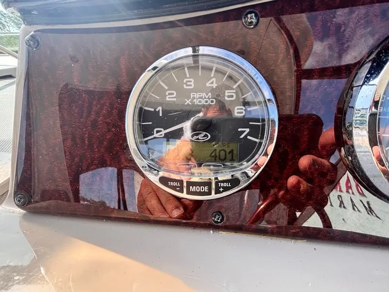 Slide: The Image of Tachometer of a 2007 Sea Ray Sundancer 310 boat, displaying 401 hours. - 14