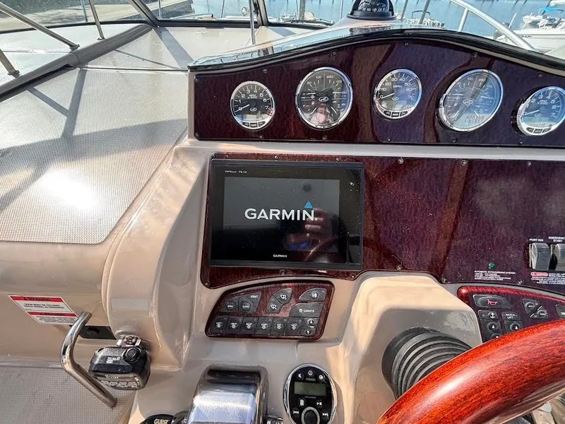 Slide: The Image of Dashboard of a 2007 Sea Ray Sundancer 310 with Garmin navigation system. - 15