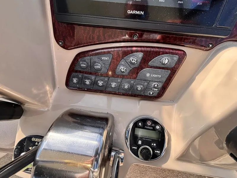 Slide: The Image of Dashboard of a 2007 Sea Ray Sundancer 310 boat with Garmin system. - 16