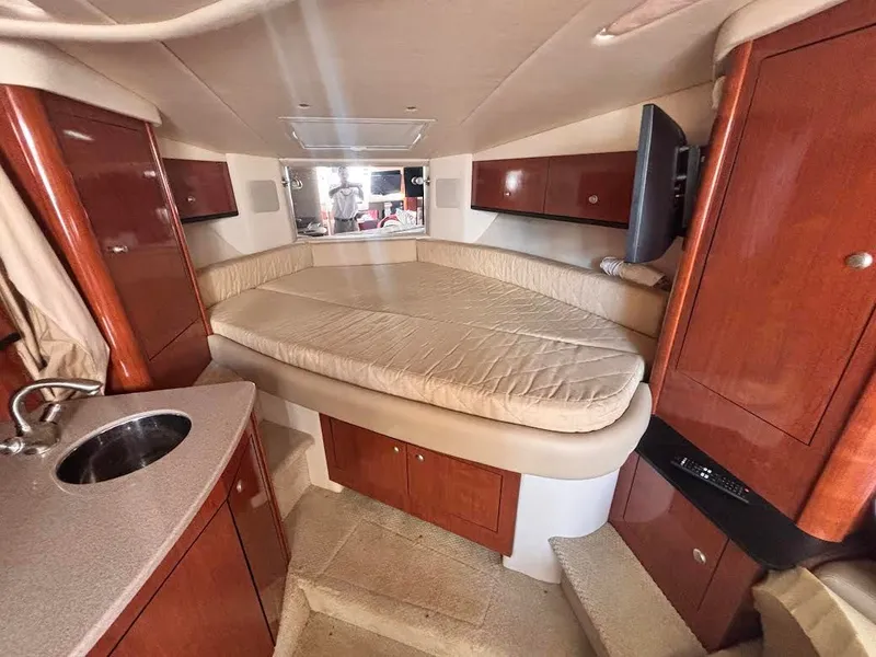 Slide: The Image of Interior of a 2007 Sea Ray Sundancer 310 yacht with sleeping area. - 21