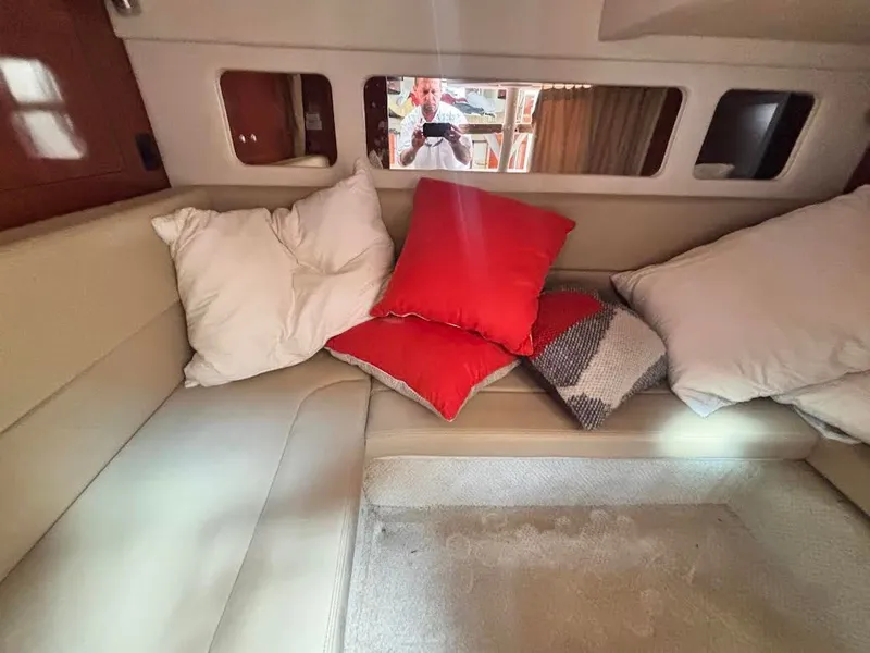 Slide: The Image of Interior of 2007 Sea Ray Sundancer 310 yacht with cushions. - 30