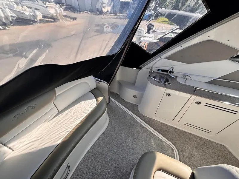 Slide: The Image of Interior of a 2007 Sea Ray Sundancer 310 yacht with seating and sink. - 9