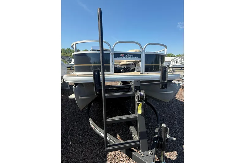 Slide: The Image of 2021 Sun Tracker Bass Buggy 16 XL Select pontoon boat on trailer. - 10