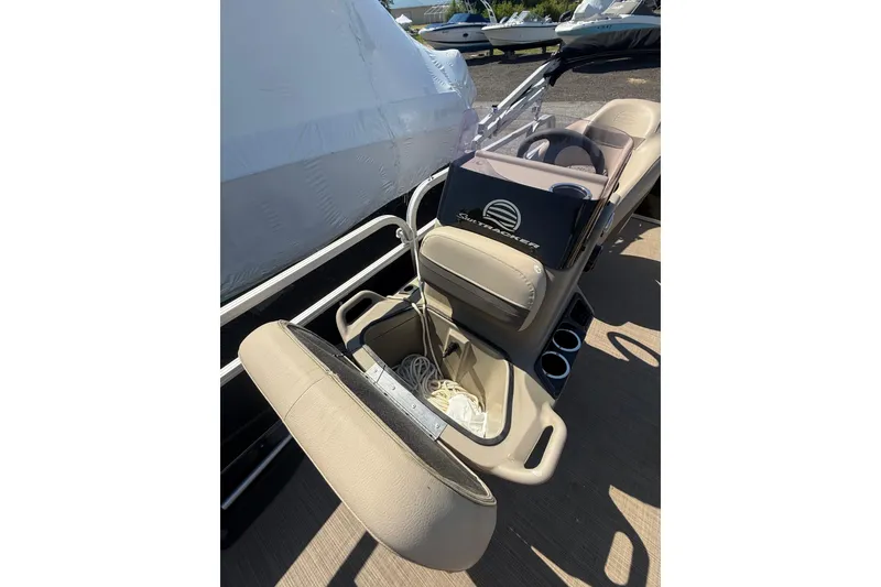 Slide: The Image of 2021 Sun Tracker Bass Buggy 16 XL Select boat interior with storage and seating. - 25