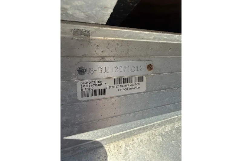 Slide: The Image of Close-up of a 2021 Sun Tracker Bass Buggy 16 XL Select identification plate. - 30