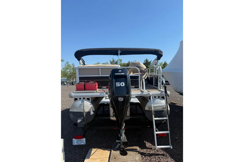 Slide: The Image of 2021 Sun Tracker Bass Buggy 16 XL Select pontoon boat with Mercury 50 engine. - 6