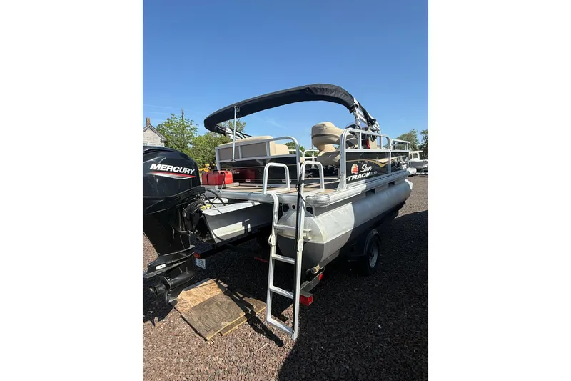 Slide: The Image of 2021 Sun Tracker Bass Buggy 16 XL Select pontoon boat with Mercury engine. - 7