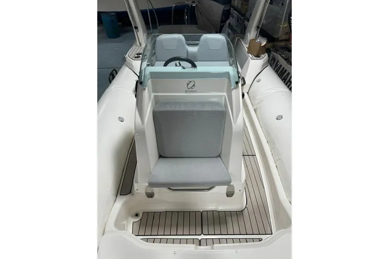 Slide: The Image of 2025 Zodiac Medline 7.5 boat interior with sleek seating and modern design. - 2
