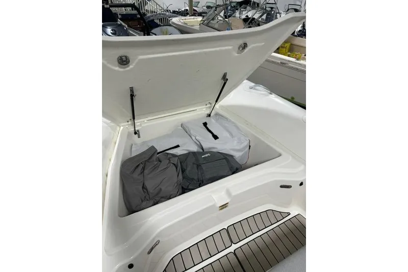 Slide: The Image of Open storage compartment on 2025 Zodiac Medline 7.5 boat, showcasing interior space. - 3