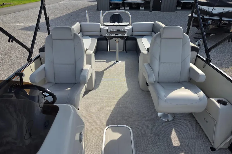 Slide: The Image of 2021 Avalon 2585 Catalina QL boat interior with plush seating and modern design. - 5