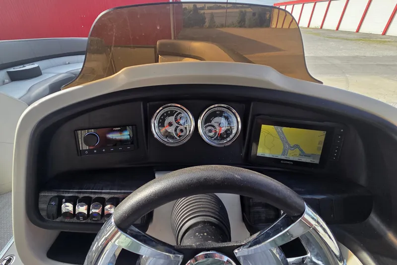 Slide: The Image of Dashboard of 2021 Avalon 2585 Catalina QL boat with GPS and controls. - 7