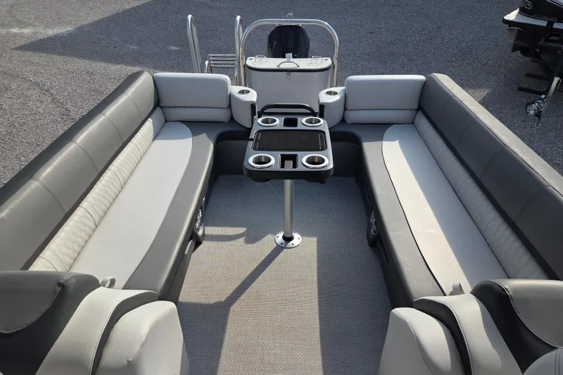 Slide: The Image of 2021 Avalon 2585 Catalina QL pontoon boat interior with spacious seating and cup holders. - 8