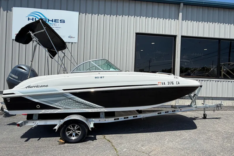 The Image of 2016 Hurricane SunDeck 187 OB boat on trailer outside dealership. - 0