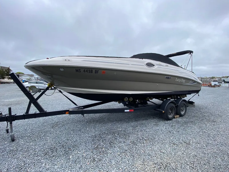 Slide: The Image of 2006 Sea Ray 240 Sundeck boat on trailer, side view. - 1