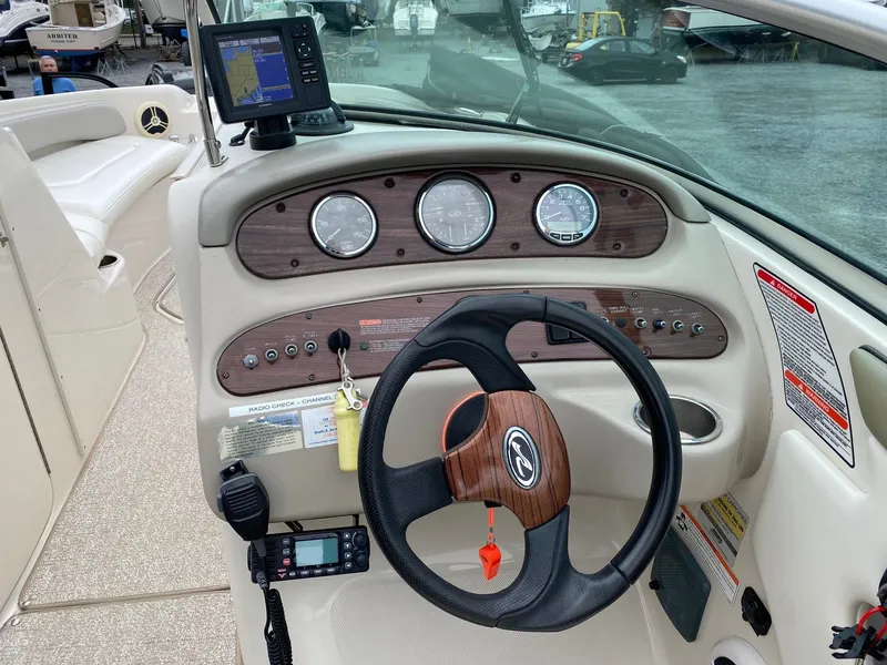Slide: The Image of Dashboard of a 2006 Sea Ray 240 Sundeck boat. - 5