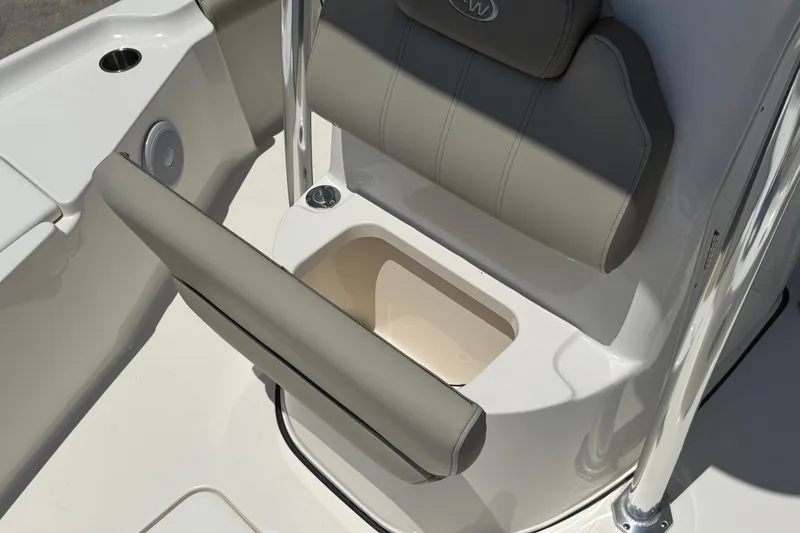 Slide: The Image of 2024 Key West 230 Bay Reef boat seat with storage compartment and cup holder. - 10