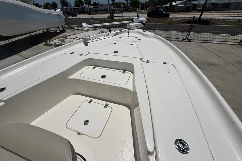 Slide: The Image of 2024 Key West 230 Bay Reef boat deck with storage compartments. - 6