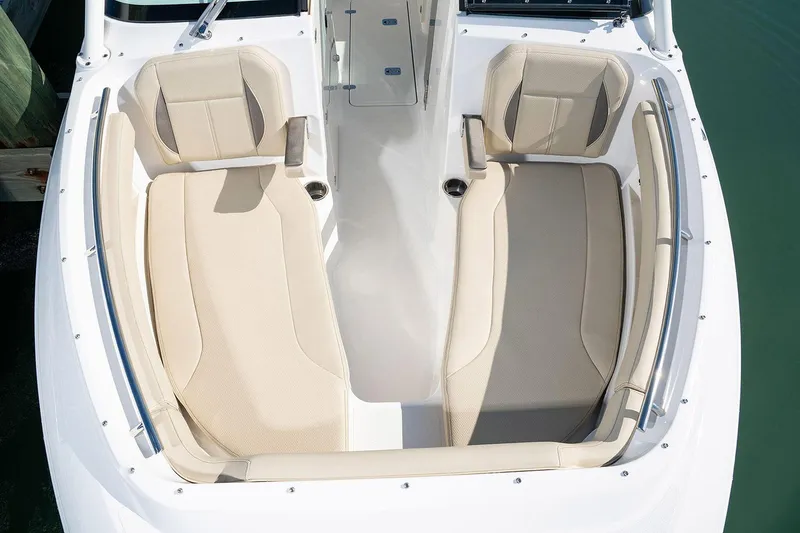Slide: The Image of Manufacturer Provided Image: 2025 Pursuit DC 266 Dual Console boat with beige seating, top view. - 2