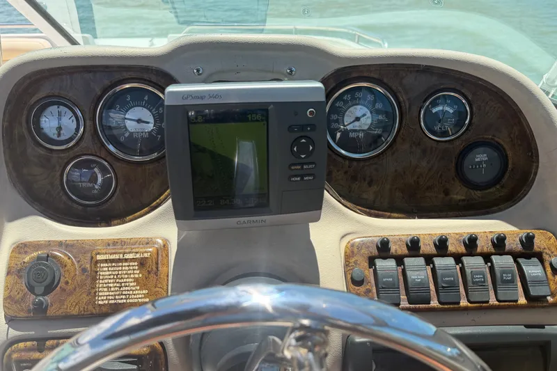 Slide: The Image of Dashboard of a 2008 NauticStar 210 DC Sport Deck with Garmin GPS and gauges. - 6