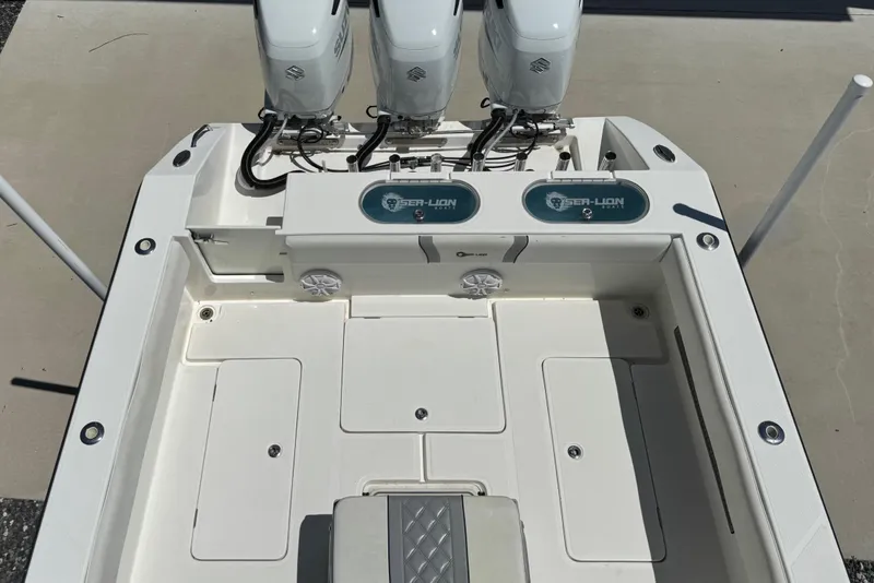 Slide: The Image of 2020 Sea-Lion 34 TE boat deck with triple engines and storage compartments. - 13