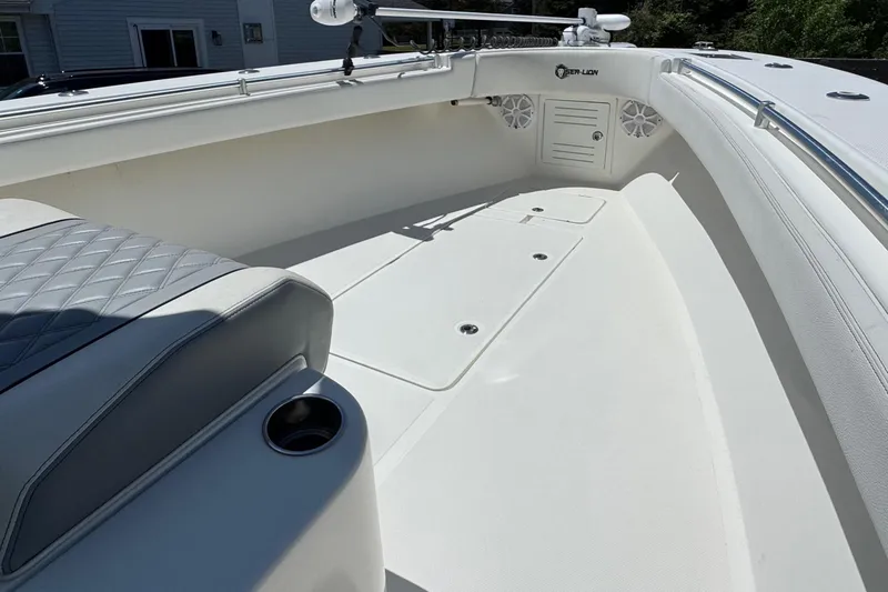 Slide: The Image of 2020 Sea-Lion 34 TE boat interior with cushioned seating and storage compartments. - 15