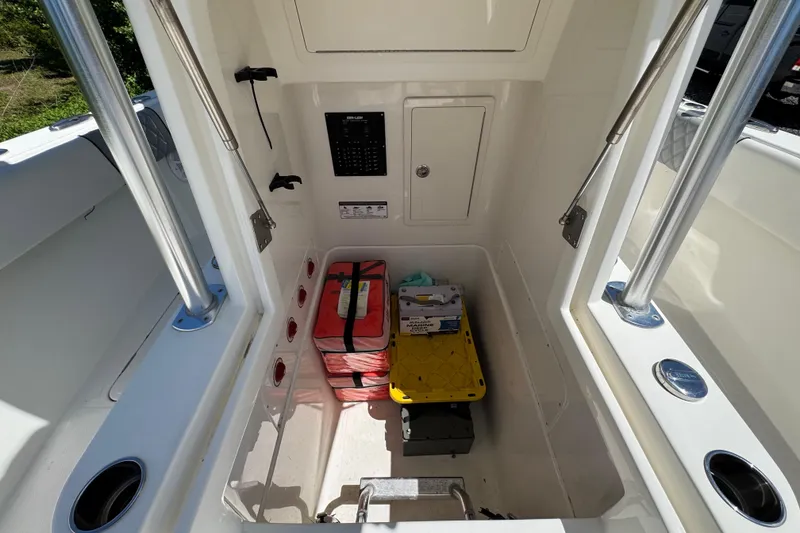 Slide: The Image of Interior storage compartment of 2020 Sea-Lion 34 TE boat with equipment and supplies. - 19