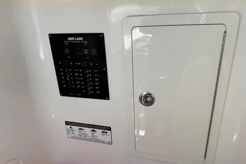 Slide: The Image of Sea-Lion 34 TE 2020 model 12V control panel with access door. - 20