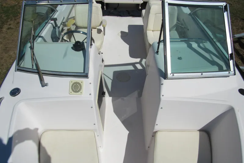 Slide: The Image of 2003 Grady-White Freedom 192 boat interior with dual consoles and seating. - 10