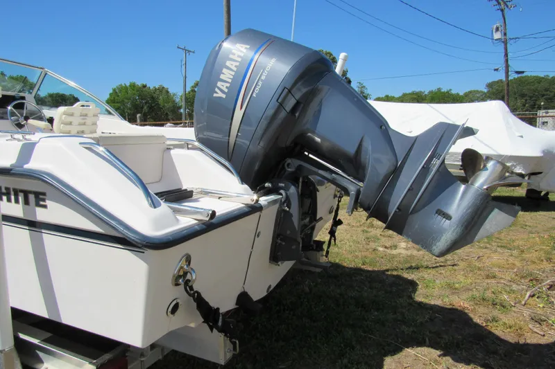Slide: The Image of 2003 Grady-White Freedom 192 boat with Yamaha outboard motor on display. - 2