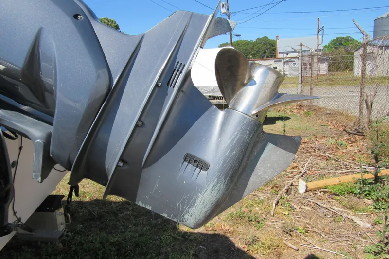 Slide: The Image of Close-up of a 2003 Grady-White Freedom 192 boat propeller outdoors. - 3