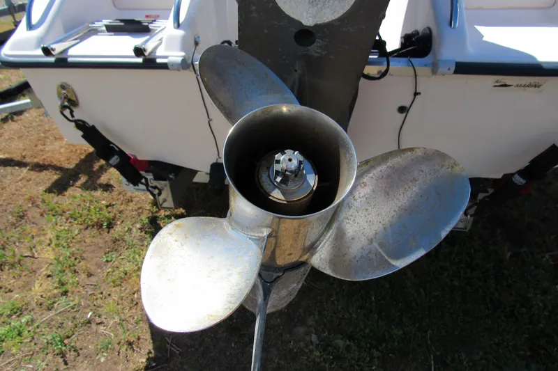 Slide: The Image of Propeller of a 2003 Grady-White Freedom 192 boat on dry land. - 4
