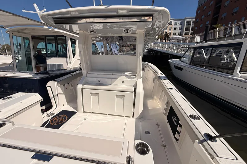 Slide: The Image of Interior view of Pursuit S 328 Sport 2026 yacht at dock. - 12