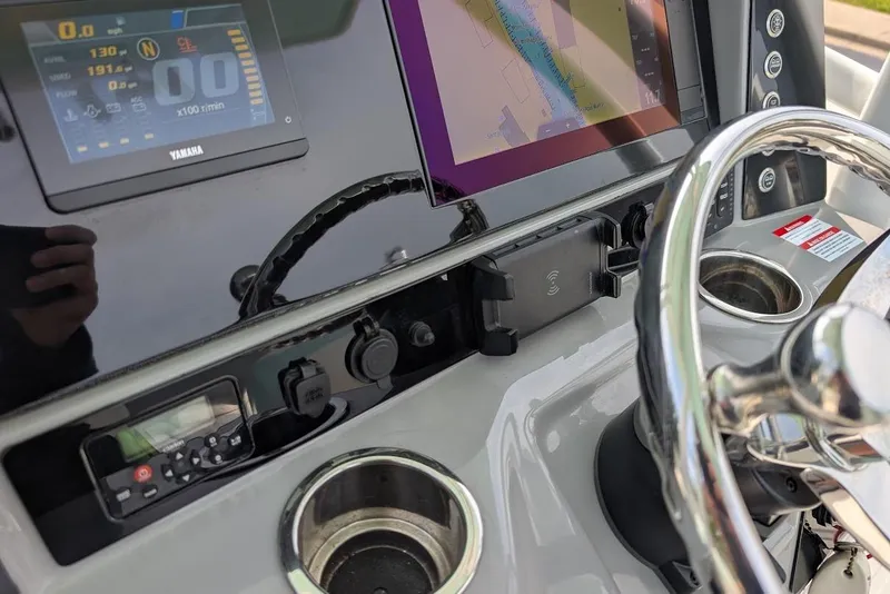 Slide: The Image of Dashboard of 2022 Robalo R242 Explorer with navigation and control systems. - 30