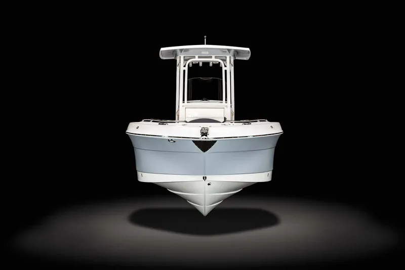 Slide: The Image of 2022 Robalo R242 Explorer boat, front view, on black background. - 48