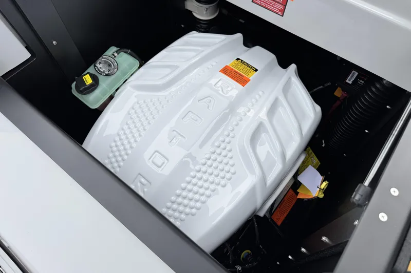 Slide: The Image of Engine compartment of 2026 Tigé 24RZX boat, showcasing modern design and components. - 22