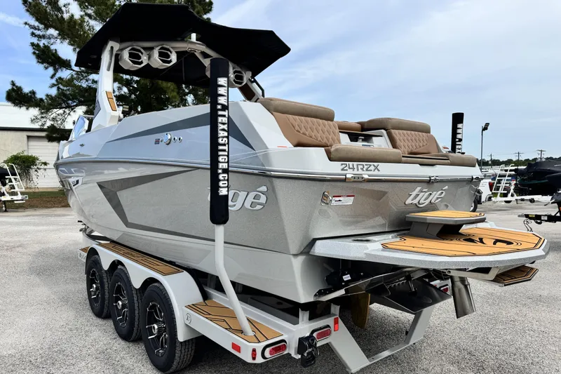 Slide: The Image of 2026 Tigé 24RZX boat on trailer, featuring sleek design and modern amenities. - 6