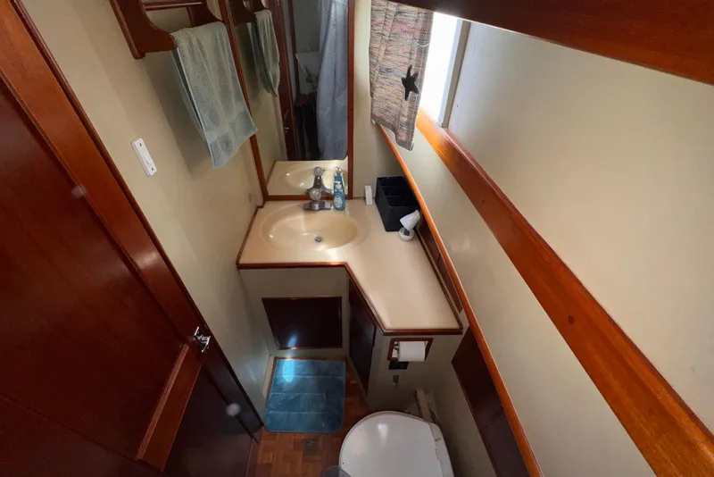 Slide: The Image of Bathroom interior of 1989 Grand Banks 42 Motoryacht with sink and toilet. - 45