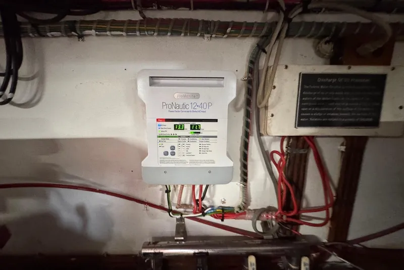 Slide: The Image of ProNautic 12-40P charger in 1989 Grand Banks 42 Motoryacht engine room. - 59