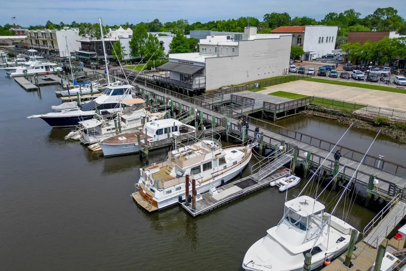 Slide: The Image of Aerial view of a 1989 Grand Banks 42 Motoryacht docked at a marina. - 6