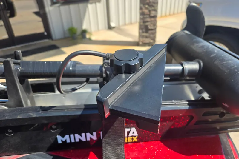 Slide: The Image of Close-up of a 2012 Stratos 189 VLO boat accessory with Minn Kota branding. - 10
