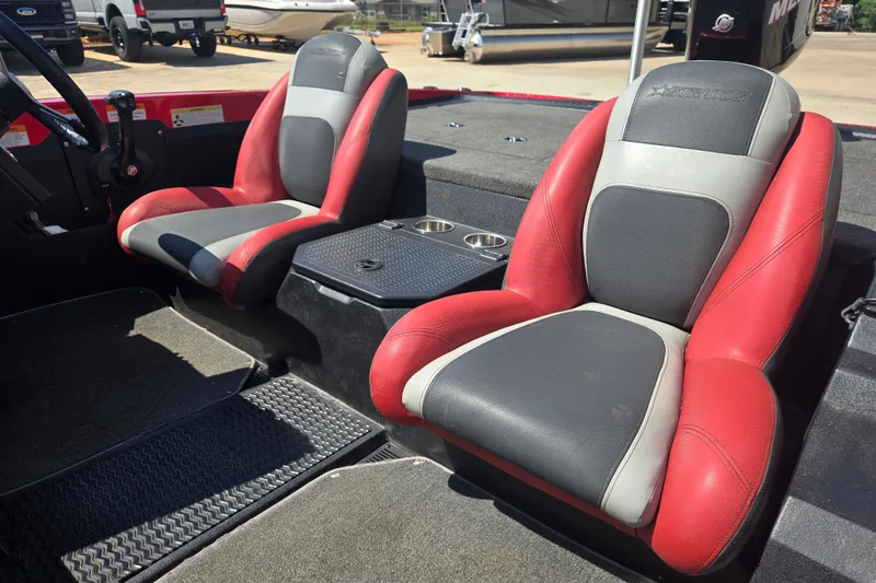 Slide: The Image of Red and gray seats in a 2012 Stratos 189 VLO boat interior. - 16