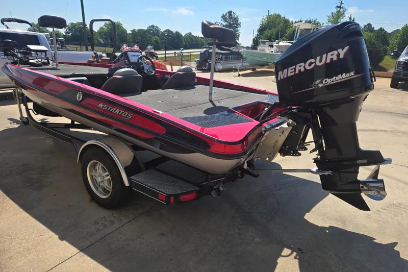Slide: The Image of 2012 Stratos 189 VLO boat with Mercury OptiMax engine on trailer. - 19