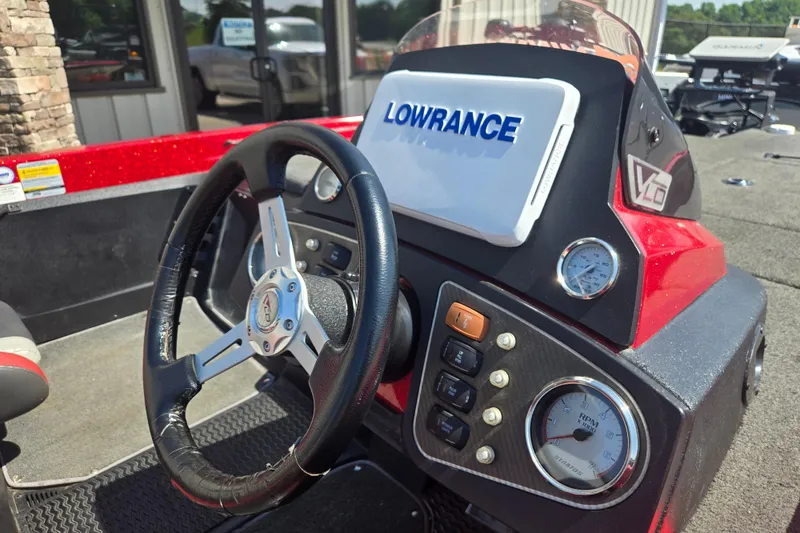 Slide: The Image of Steering console of 2012 Stratos 189 VLO boat with Lowrance display. - 6