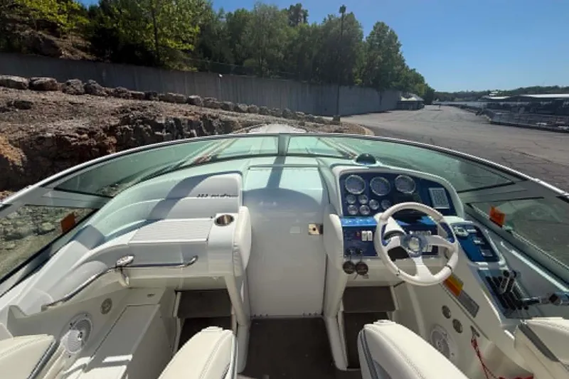 Slide: The Image of 2007 Formula 353 FASTech boat cockpit with sleek design and modern controls. - 13
