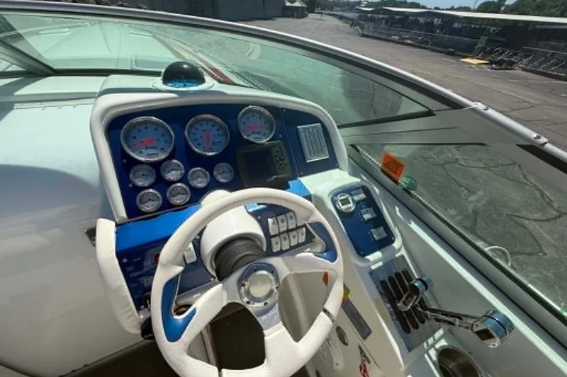 Slide: The Image of Cockpit of 2007 Formula 353 FASTech boat with steering wheel and instrument panel. - 14