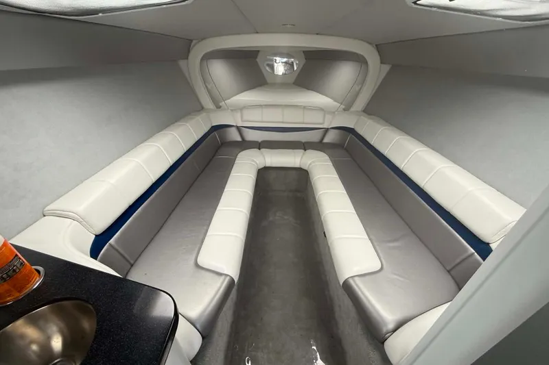 Slide: The Image of Interior of 2007 Formula 353 FASTech boat with white and gray seating. - 8