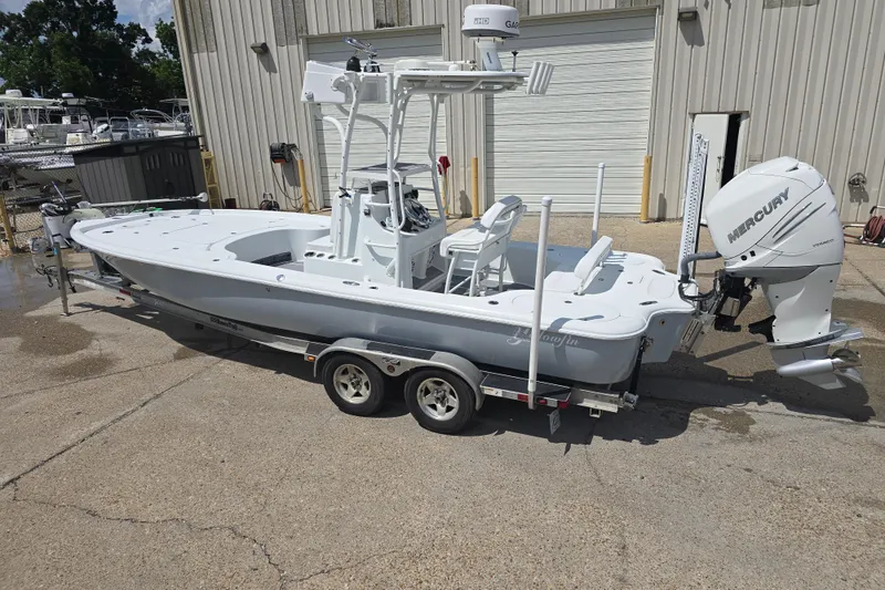 Slide: The Image of 2007 Yellowfin 24 Bay boat on trailer with Mercury outboard engine. - 2