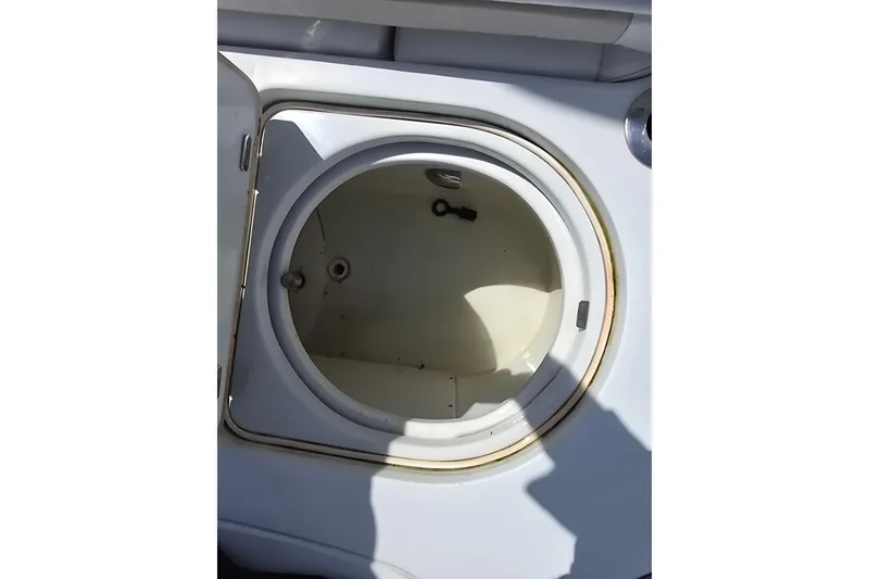 Slide: The Image of Open storage compartment on a 2007 Yellowfin 24 Bay boat. - 23